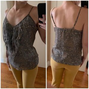 Grey floral top with adjustable spaghetti straps and riffled accents